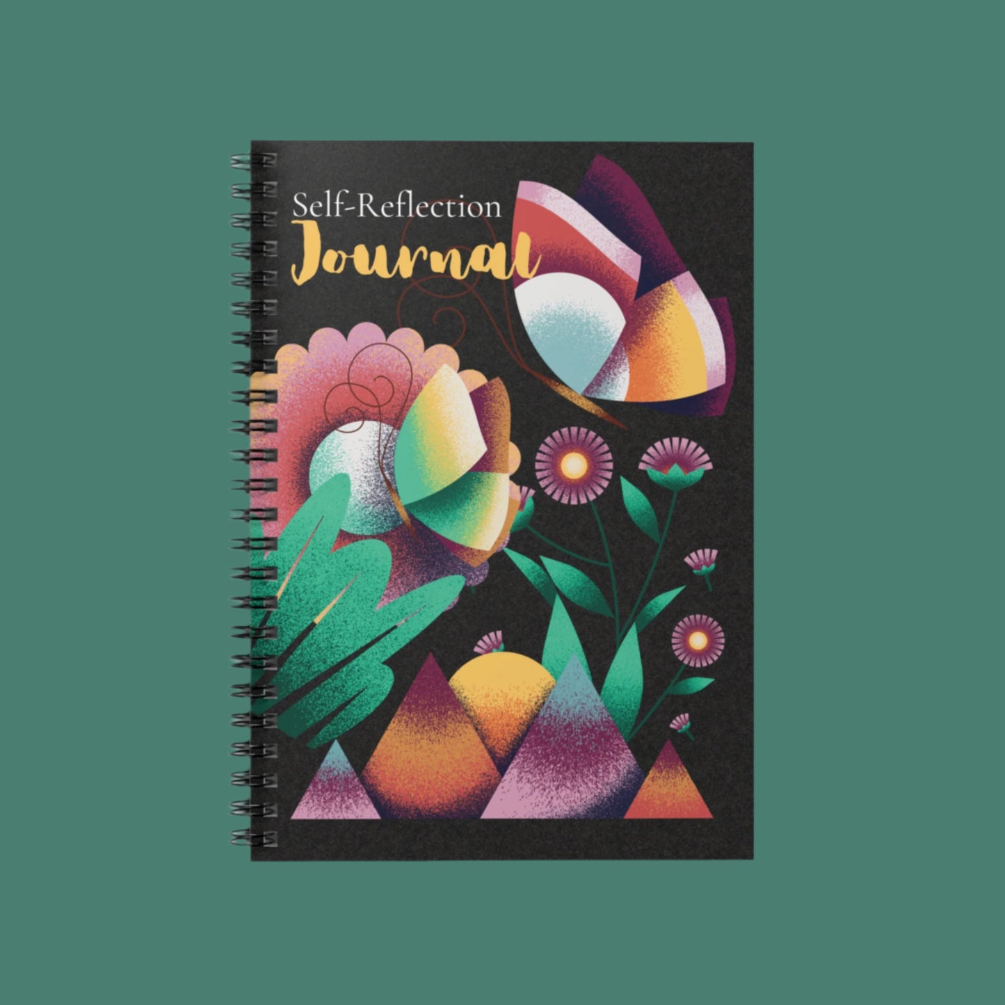 A spiral notebook with a colorful floral design on the cover, labeled 'Self-Reflection Journal'.